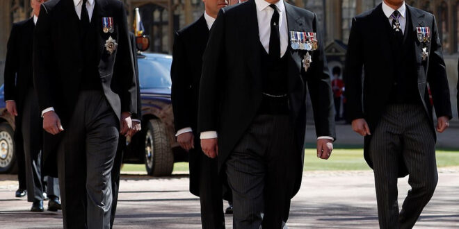 Prince Andrew wears a suit to Philip