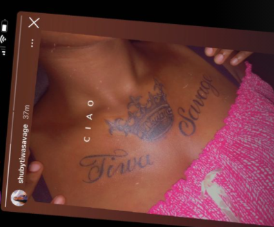 tiwa-savage-stunned-as-fan-tattoos-name-on-chest