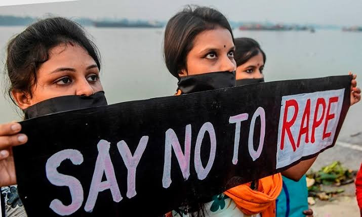 Woman fighting for her life after she was beaten, gang raped and left hanging naked from an electricity pole in India