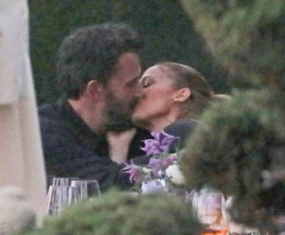Jennifer Lopez and Ben Affleck seen kissing a dinner party after reuniting