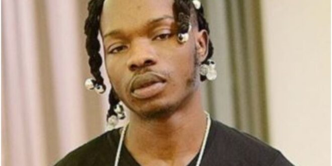 Naira Marley Under Fire For Using The Butt Of Fangirl To Deliver A Dare
