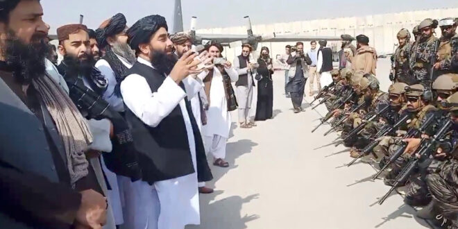 Photos: Triumphant Taliban parades at Kabul airport after US exit