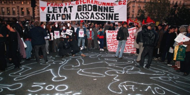 France remembers Paris massacre amid tensions with Algeria
