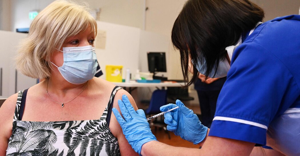 Britain’s health secretary urges people to get booster shots amid a surge.