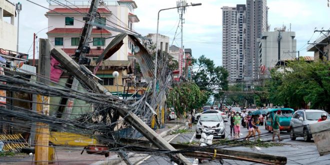 Death toll from Super Typhoon Rai climbs to at least 75 people in the Philippines