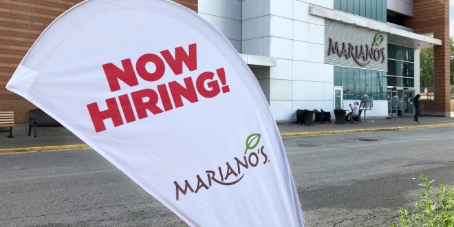 US job openings hover near record, but fewer workers quit