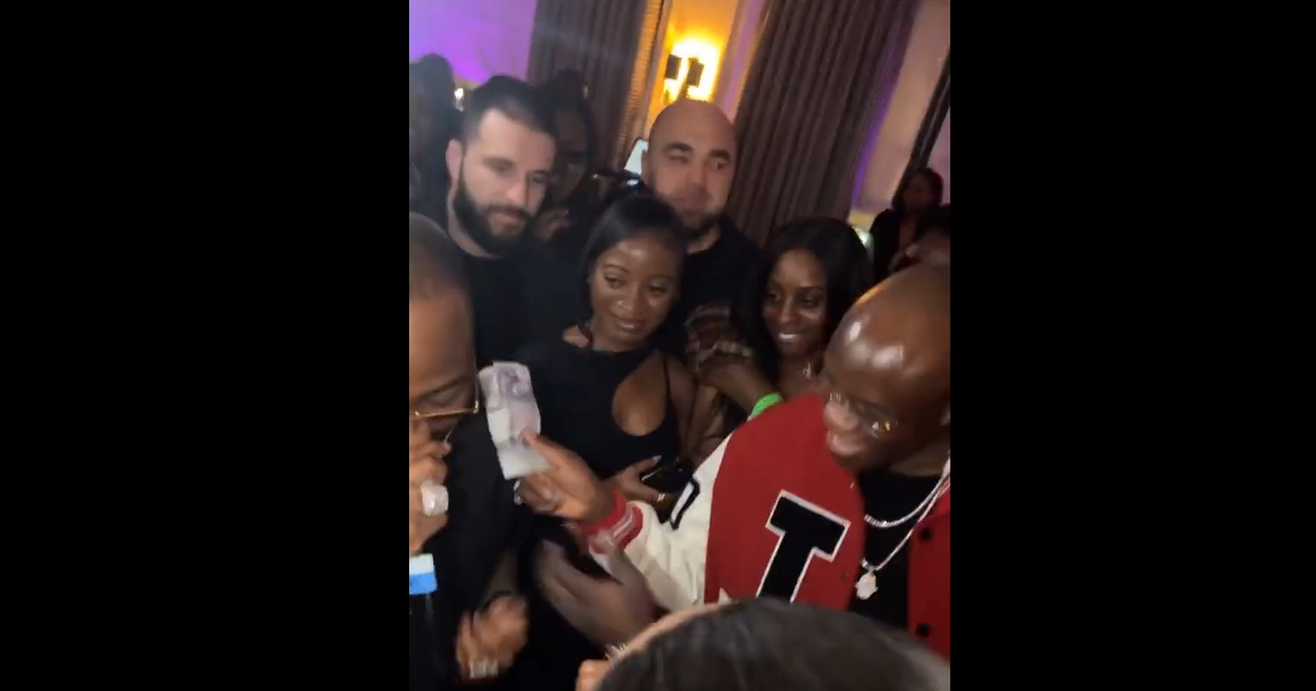 Watch: Nigerian “Celebrity Pastor” showers bundles of pounds on Davido at a party in London