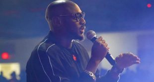 2Face Idibia tattoos names of his 7 children on his arm