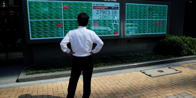 Asian stocks dive after Wall Street selloff over inflation, COVID