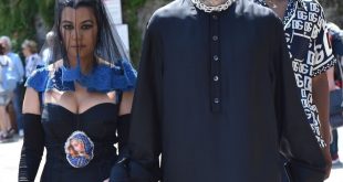 Kourtney Kardashian wears black veil and black dress with a picture of the Virgin Mary as she prepares to wed Travis Barker in Italy