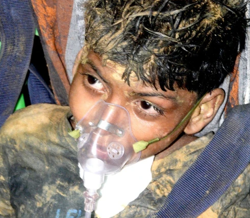 Boy,11, rescued from well after being trapped there for 4 days with snakes, frogs and scorpions is in intensive care