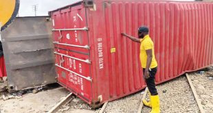 One injured as container-laden truck falls on Lagos rail tracks