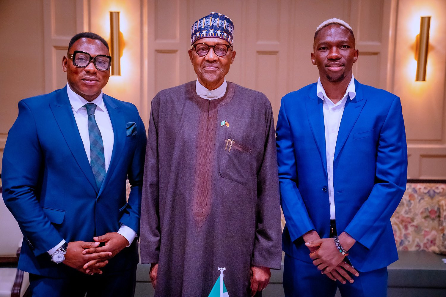 President Buhari meets  Daniel Omokachi and Kenneth Omeruo in Spain, receives signed balls and jerseys (photos)