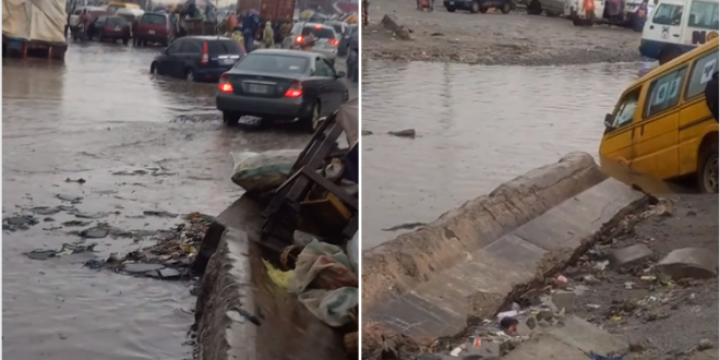 Cars stuck on a flooded road at Volks Bus Stop in Lagos (video)