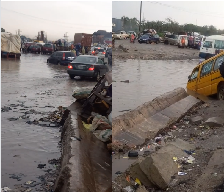 Cars stuck on a flooded road at Volks Bus Stop in Lagos (video)