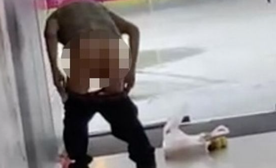 Man removes pants to poo in middle of shopping centre