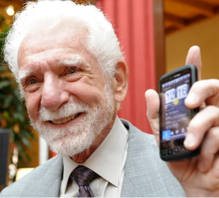 Man who invented the mobile phone says people who spend so much time on their phones need to ?get a life?