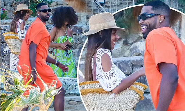 Unbothered Tristan Thompson gets flirty while in the company of two mystery women in Greece as he awaits birth of his fourth child (Photos)