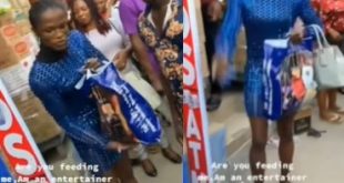 Are you feeding me? - Crossdresser challenges market men who harassed him for dressing like a lady (video)