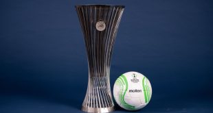 A view of the UEFA Europa Conference League 2022/23 Group Stage match ball next to the UEFA Europa Conference League trophy during the UEFA Club Competitions 2022/23 Match Balls Shoot at the UEFA Headquarters, The House of the European Football, on August 3, 2022, in Nyon, Switzerland.