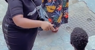 Trending video of lady praying fervently for a mentally unstable man on the streets of Lagos