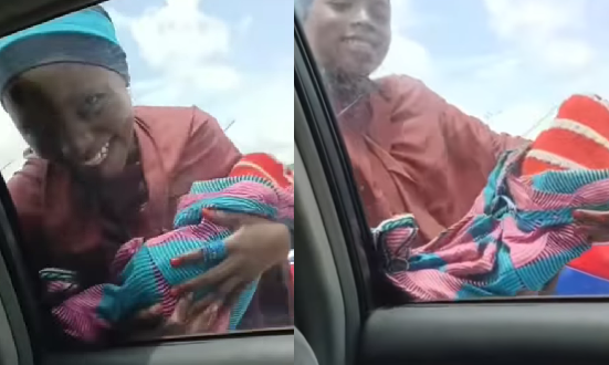 Beggar using fake baby to garner sympathy is exposed in Lagos (video)