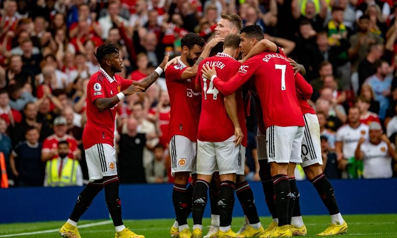 Manchester United players celebrate one of their goals in the 3-1 win over Arsenal at Old Trafford.
