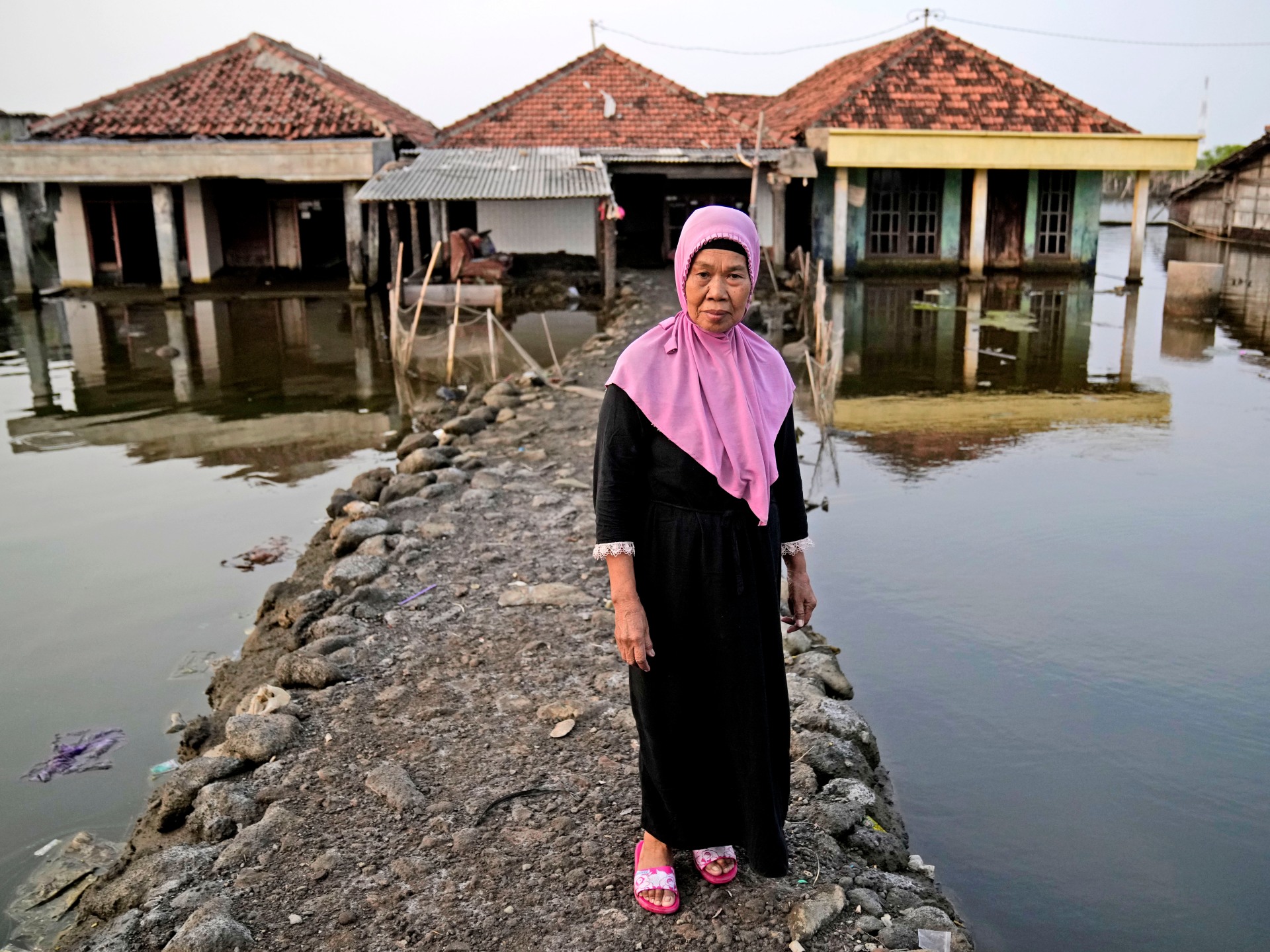 ‘It’s just like the ocean here now’: Indonesia’s flooded villages