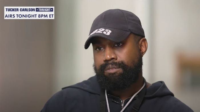 Kanye West Tells Tucker Carlson 'They Threatened My Life' For Wearing MAGA Hat