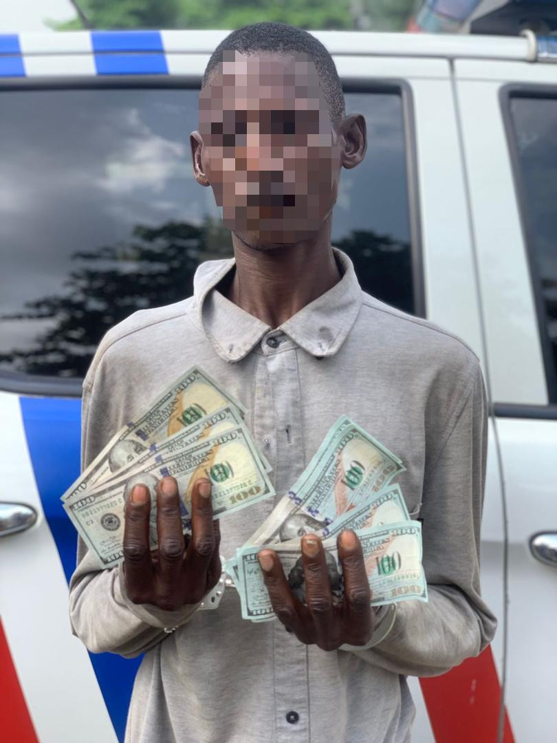 Man arrested with fake dollar notes in Lagos