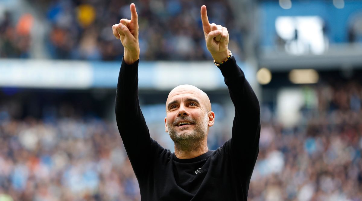 Manchester City manager Pep Guardiola celebrates his team