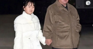 North Korean leader, Kim Jong-un pictured with his daughter for the first time at a missile launch