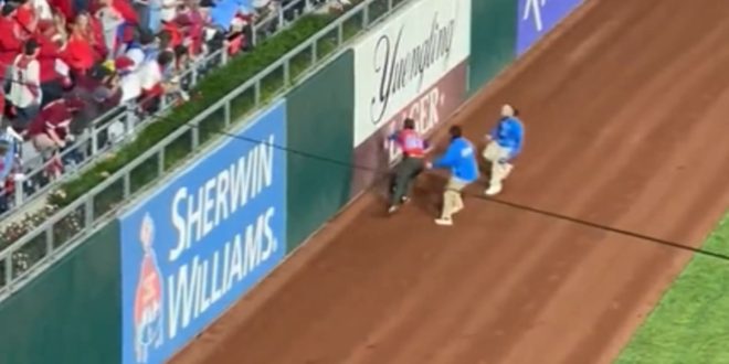 Phillies Fan Runs on Field During World Series