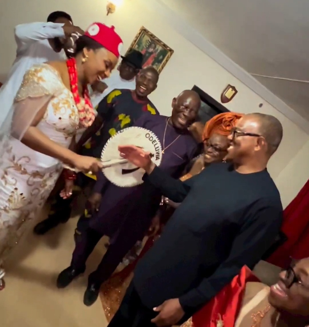 Chief Chimamanda Ngozi Adichie and Peter Obi shake hands in the traditional Igbo way (photos/video)