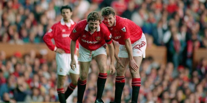 Steve Bruce and Gary Pallister of Manchester United laugh during the Premier League match between Manchester United and Blackburn Rovers on 3 May, 1993 at Old Trafford in Manchester, United Kingdom.