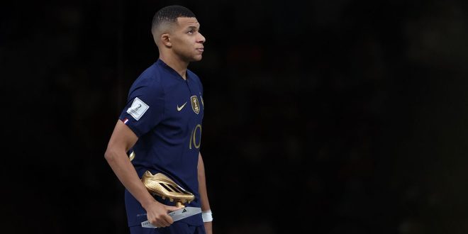 Kylian Mbappe of France poses for a photo with the adidas Golden Boot during the FIFA World Cup Qatar 2022 Final match between Argentina and France at Lusail Stadium on December 18, 2022 in Lusail City, Qatar.