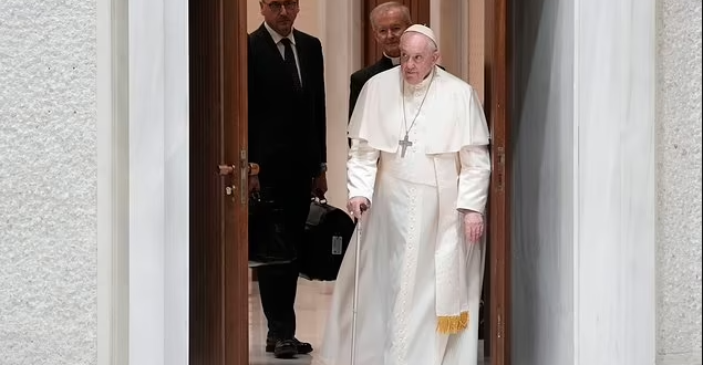 Pope Francis warns Vatican staff an