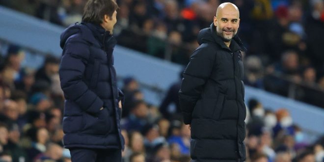 Tottenham Hotspur head coach Antonio Conte and Manchester City manager Pep Guardiola on the touchline during the Premier League match between Manchester City and Tottenham Hotspur on 19 February, 2022 at the Etihad Stadium in Manchester, United Kingdom