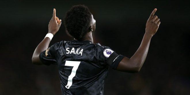 Bukayo Saka of Arsenal celebrates after scoring the team