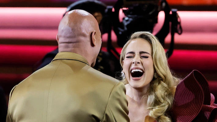 Actor Dwayne Johnson reveals how he was able to surprise his super-fan Adele at the Grammy Awards
