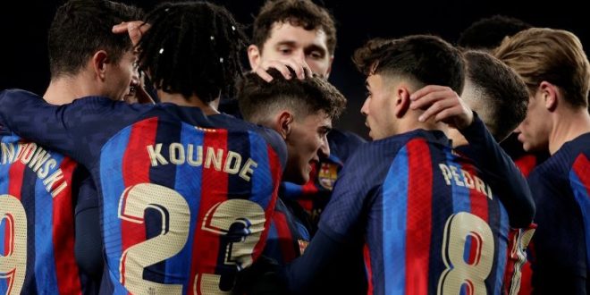 Barcelona players celebrate one of their goals in the 3-0 win over Sevilla at Camp Nou in February 2023.