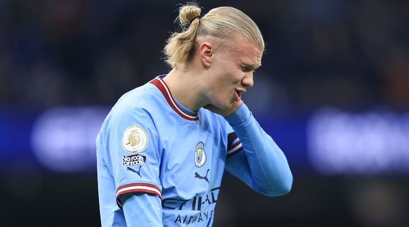 Manchester City striker Erling Haaland holds his head during his side