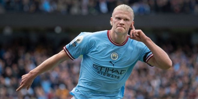 Erling Haaland celebrates after scoring for Manchester City against Manchester United..