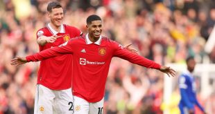Marcus Rashford of Manchester United celebrates with teammate Wout Weghorst after scoring his side