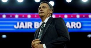 Bolsonaro greeted by small group of supporters on return to Brazil for first time since riots | CNN