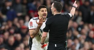 Fulham striker Aleksadar Mitrovic is sent off for pushing referee Chris Kavanagh in his side