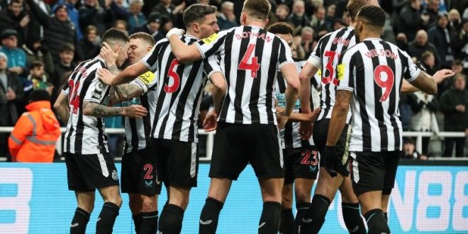 Newcastle players celebrate Miguel Almiron