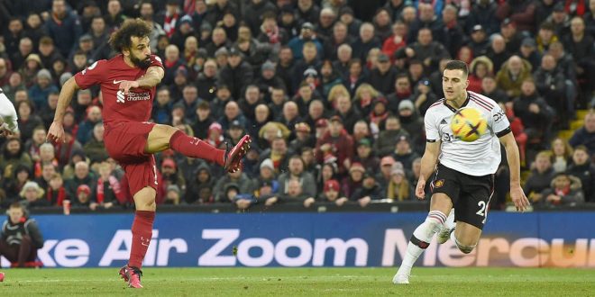 Mohamed Salah of Liverpool scores the fourth goal making the score during the Premier League match between Liverpool FC and Manchester United at Anfield on March 05, 2023 in Liverpool, England.
