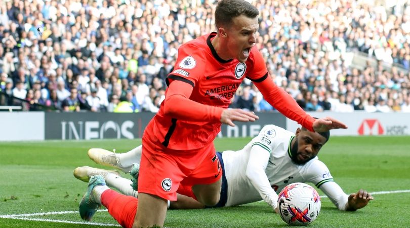 Solly March goes down under a challenge from Japhet Tanganga in Brighton