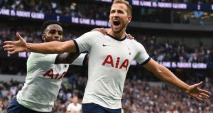 Harry Kane of Tottenham Hotspur celebrates with teammate Danny Rose after scoring his team